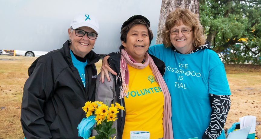 Three Walk of Hope Volunteers