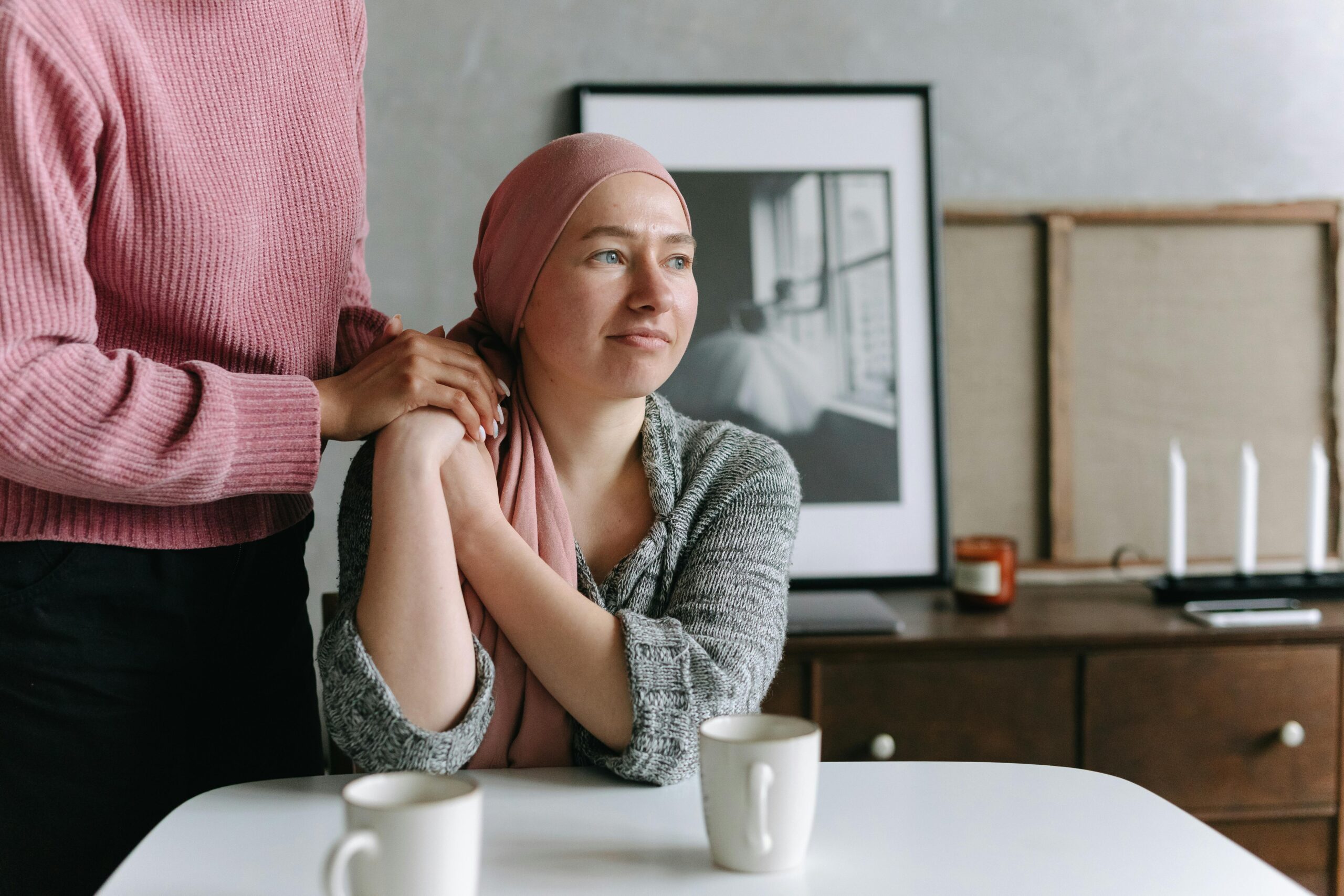 Woman being consoled.