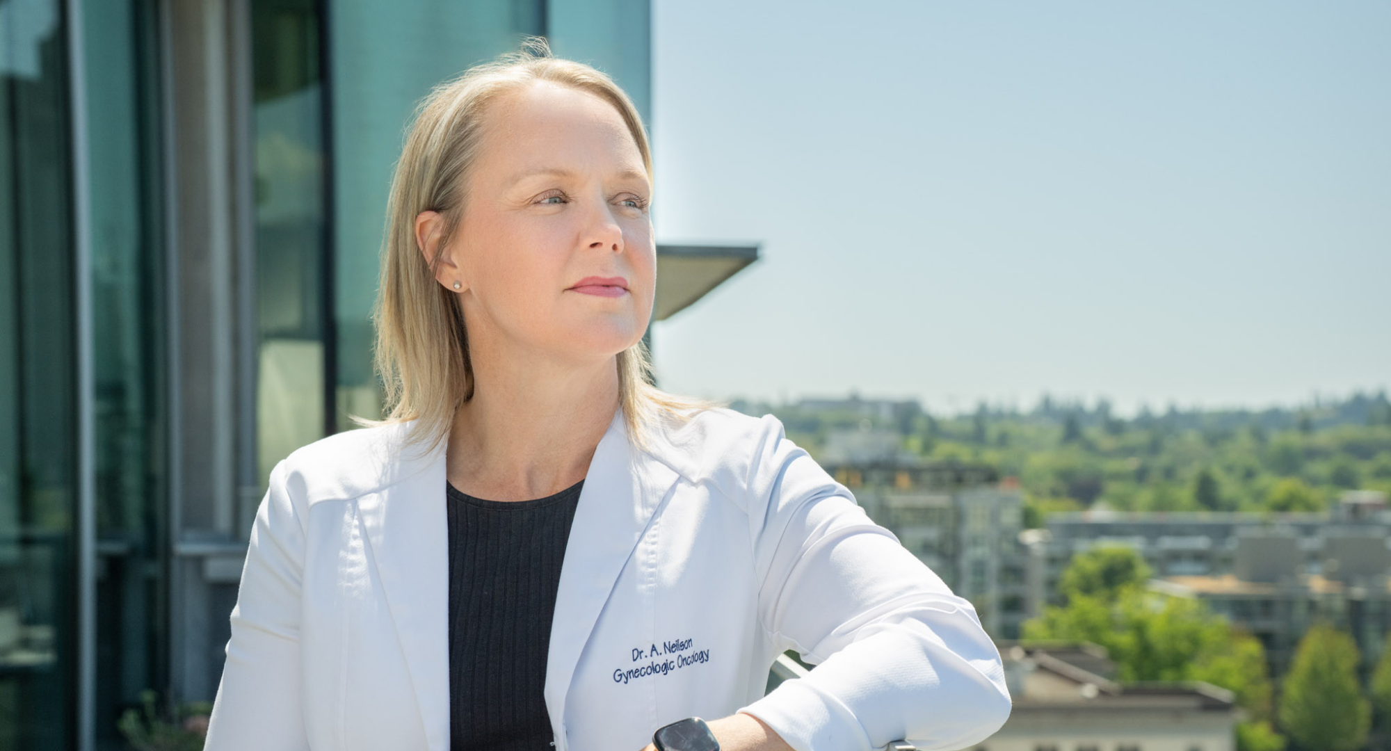 Female researcher in white lab coat